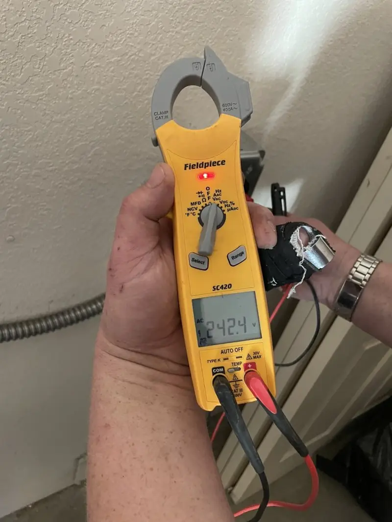 Voltage testing with clamp meter during Generator Installation in Kenedy